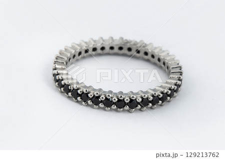 Silver diamond ring isolated on white background. Silver jewelry fashion ring 129213762