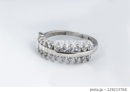 Silver diamond ring isolated on white background. Silver jewelry fashion ring Silver diamond ring isolated on white background. Silver jewelry fashion ring 129213768