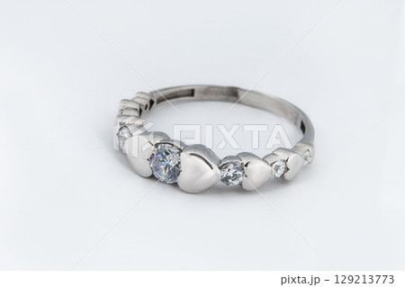 Silver diamond ring isolated on white background. Silver jewelry fashion ring Silver diamond ring isolated on white background. Silver jewelry fashion ring 129213773