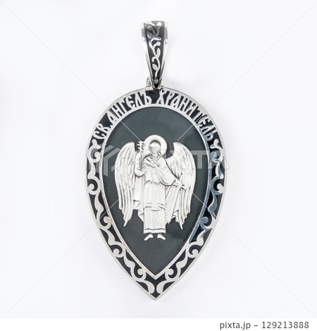 Gold pendant with the Virgin Mary christian symbol isolated on white Gold pendant with the Virgin Mary christian symbol isolated on white 129213888