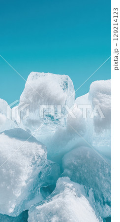 Pristine ice blocks stacked under a clear blue sky creating a crisp and refreshing scene, AI Generative 129214123