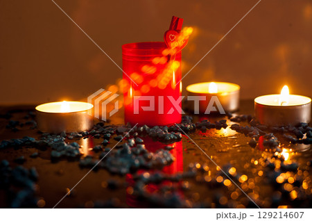 Romantic atmosphere of lighted candles Romantic atmosphere of lighted candles 129214607