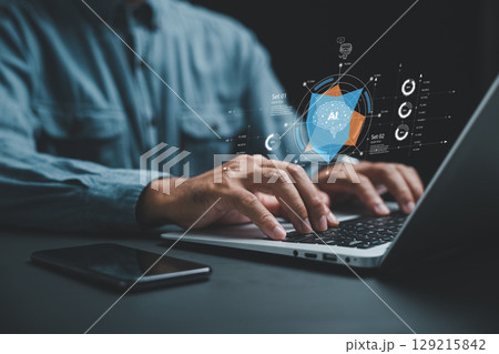 AI helps generate business with intelligent automation and a BPA system while a businessman at his desk uses a laptop to give instructions to the AI, driving process automation efficiently 129215842