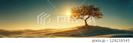 Serene Sunrise Over Desert Landscape with Lone Tree in Golden Light and Starry Sky 129216545