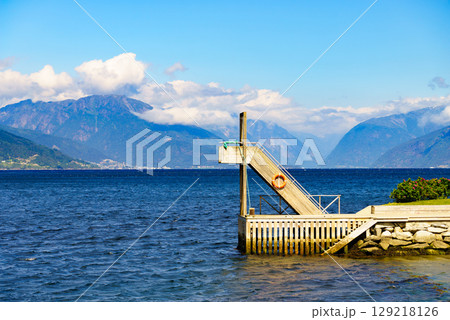 Old wooden on pier, norway fjord 129218126