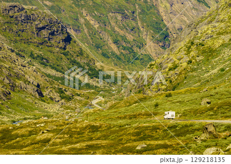 Camper car on road trip 129218135