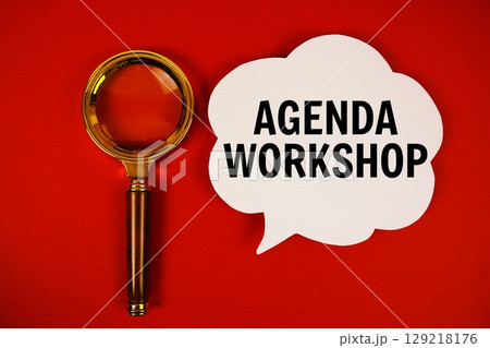 Agenda Workshop text with speech bubble and magnifying glass on red background 129218176