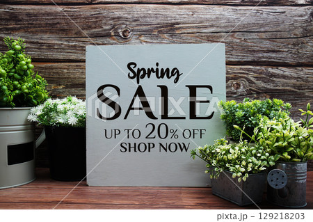 Hello Spring Sale 20% off Promotion Offer Discount Retail Shopping Concept Hello Spring Sale 20% off Promotion Offer Discount Retail Shopping Concept 129218203