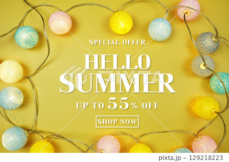 Summer Sale 55% text with LED cotton balls Decorated on yellow background 129218223