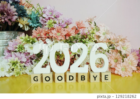 Goodbye 2026 alphabet letters with flowers decorate on yellow background 129218262