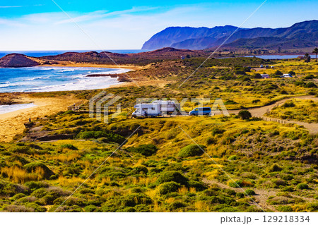 Coast view with camper rv camping on sea shore, Spain Coast view with camper rv camping on sea shore, Spain 129218334