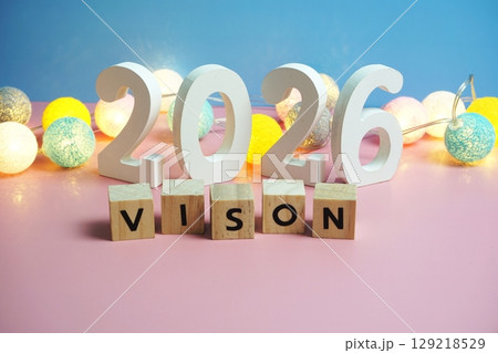 Vision 2026 word alphabet letters on pink and blue background Vision 2026 word alphabet letters on pink and blue background 129218529