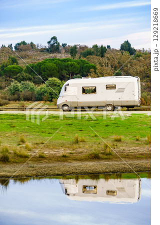Camper rv camping at lake shore. Alentejo Portugal. 129218669