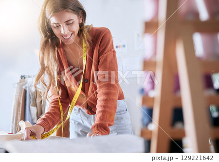 Fashion, clothes designer and woman drawing sketch for fabric pattern during manufacturing process in workshop for creative business. Female planning design and production of creative startup project Fashion, clothes designer and woman drawing sketch for fabric pattern during manufacturing process in workshop for creative business. Female planning design and production of creative startup project 129221642