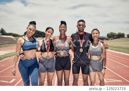 Portrait, diversity and team for sports winner, for competition and group smile together outdoor. Teamwork, fitness training and medals for games, success and victory for embrace, happy and on track. 129221728
