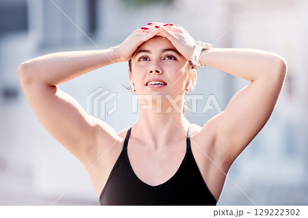 Athlete woman, disappointed and hands on head, sad and loser at competition, contest or race. Runner girl, failure and tired of running, sports or marathon in city, metro or urban town with regret 129222302