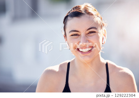 Earphones, face and sports woman in city streaming music, podcast or radio. Portrait, fitness and female from Australia outdoors listening to audio and getting ready for training, running or workout Earphones, face and sports woman in city streaming music, podcast or radio. Portrait, fitness and female from Australia outdoors listening to audio and getting ready for training, running or workout 129222304