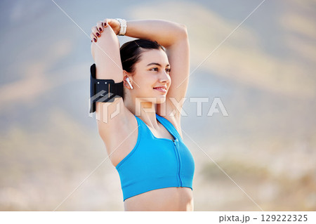 Runner, fitness and stretching with a sports woman outdoor in nature getting ready for a run or cardio workout. Health, wellness and exercise with a female athlete doing a warm up routine or training Runner, fitness and stretching with a sports woman outdoor in nature getting ready for a run or cardio workout. Health, wellness and exercise with a female athlete doing a warm up routine or training 129222325