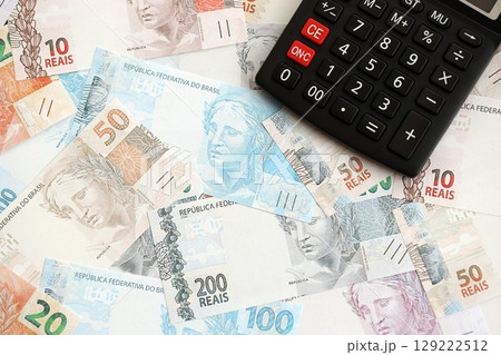 Brazilian reais banknotes and calculator. The current Brazil real money bills and calculator 129222512