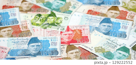 Pakistan rupees banknotes. The current Pakistan money bills lies on table in big amount 129222552
