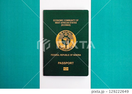 Nigerian passport on flag. The concept of citizenship Nigerian passport on flag. The concept of citizenship 129222649