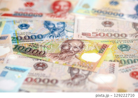 Vietnamese dong currency money bills. The current banknotes lies on table in big amount 129222710