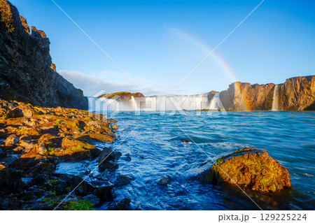 Magical view of powerful Godafoss cascade. Location Skjalfandafljot river, Iceland Europe. Magical view of powerful Godafoss cascade. Location Skjalfandafljot river, Iceland Europe. 129225224