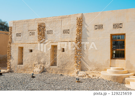 Ras Al Khaimah, UAE – 14.04.2025: The desert coastal town (ghost town) of Jazeera Al Hamra includes a fort, three schools, an open-air market and mosques nestled between hundreds of villas . High Ras Al Khaimah, UAE – 14.04.2025: The desert coastal town (ghost town) of Jazeera Al Hamra includes a fort, three schools, an open-air market and mosques nestled between hundreds of villas . High 129225659