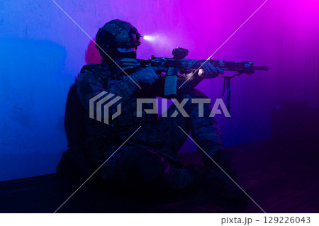 Tactical Soldier in Action Helmet On Off Dramatic Lights Smoke Tactical Soldier in Action Helmet On Off Dramatic Lights Smoke 129226043