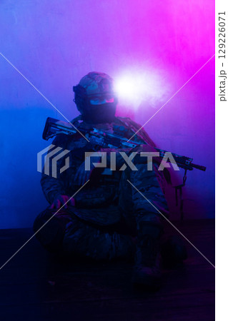 Tactical Soldier in Action Helmet On Off Dramatic Lights Smoke Tactical Soldier in Action Helmet On Off Dramatic Lights Smoke 129226071