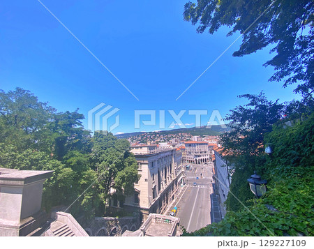 View at street of Trieste, Italy. Trieste is the capital city of the Friuli Venezia Giulia region in northeast Italy View at street of Trieste, Italy. Trieste is the capital city of the Friuli Venezia Giulia region in northeast Italy 129227109