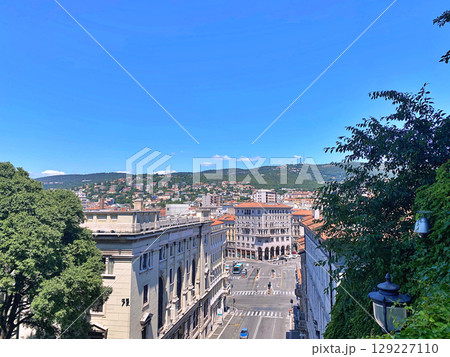 View at street of Trieste, Italy. Trieste is the capital city of the Friuli Venezia Giulia region in northeast Italy View at street of Trieste, Italy. Trieste is the capital city of the Friuli Venezia Giulia region in northeast Italy 129227110