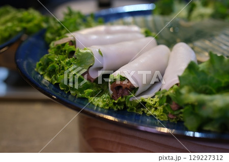 Chicken wraps with avocado, tomatoes and iceberg lettuce. Tortilla, burritos, sandwiches, twisted rolls. View from above, top Chicken wraps with avocado, tomatoes and iceberg lettuce. Tortilla, burritos, sandwiches, twisted rolls. View from above, top 129227312