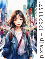 都会の雑踏の中に佇む若い女性 129231571