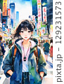 都会の雑踏の中に佇む若い女性 129231573