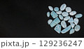 Natural larimar gemstone with ocean-inspired patterns, banner. Unique mineral reflecting tranquility and tropical beauty 129236247