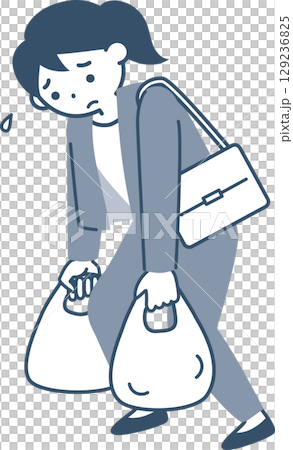 Young woman walking with heavy shopping bags 129236825