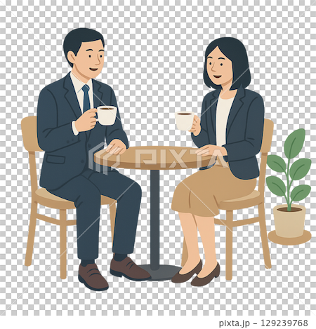 一男一女正在交談，微微點頭，手裡拿著咖啡 129239768