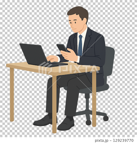 一名男子同時使用筆記型電腦和智慧型手機 一名男子同時使用筆記型電腦和智慧型手機 129239770