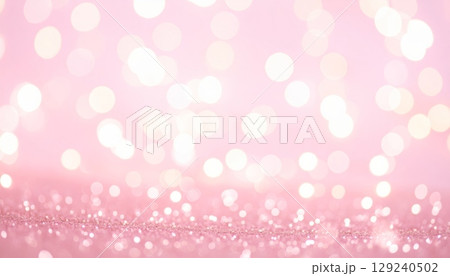 An abstract pink bokeh light background with glowing hearts and sparkle texture 129240502