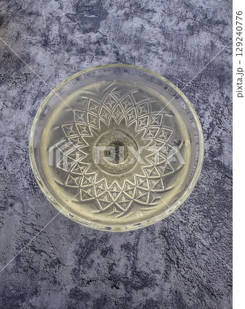 Elegant bubbly drink in etched glass, luxury celebration mood. High quality photo Elegant bubbly drink in etched glass, luxury celebration mood. High quality photo 129240776