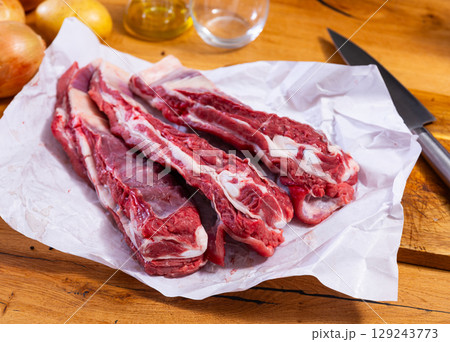 Raw beef brisket served at table 129243773