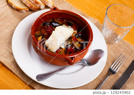 Bacalao is a popular dish Portuguese cuisine Bacalao is a popular dish Portuguese cuisine 129243902