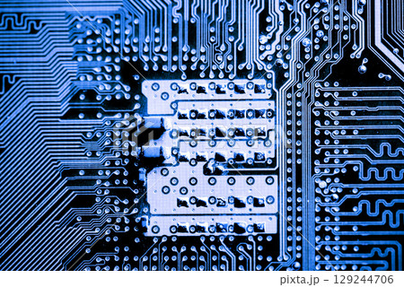 Abstract, Close up at electronic circuits, we see the technology of the mainboard, which is the important background of the computer.logic board,cpu motherboard,Main board,system board,mobo Abstract, Close up at electronic circuits, we see the technology of the mainboard, which is the important background of the computer.logic board,cpu motherboard,Main board,system board,mobo 129244706