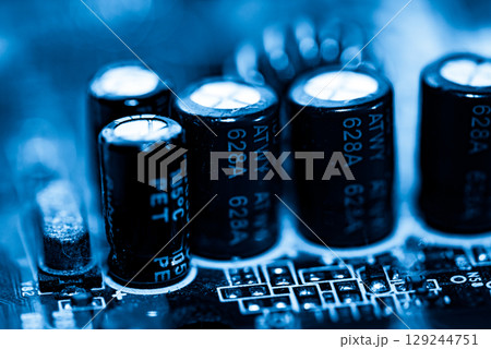 Abstract, Close up at electronic circuits, we see the technology of the mainboard, which is the important background of the computer.logic board,cpu motherboard,Main board,system board,mobo	 129244751