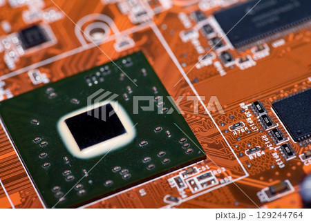 Abstract, Close up at electronic circuits, we see the technology of the mainboard, which is the important background of the computer.logic board,cpu motherboard,Main board,system board,mobo Abstract, Close up at electronic circuits, we see the technology of the mainboard, which is the important background of the computer.logic board,cpu motherboard,Main board,system board,mobo 129244764