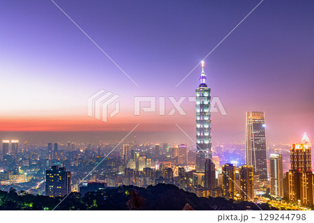 Jiufen Old Street is a narrow, winding alleyway with shops, teahouses, and restaurants that offers tourists a view of traditional Taiwanese life. 129244798