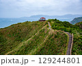 Jiufen Old Street is a narrow, winding alleyway with shops, teahouses, and restaurants that offers tourists a view of traditional Taiwanese life. 129244801