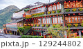 Jiufen Old Street is a narrow, winding alleyway with shops, teahouses, and restaurants that offers tourists a view of traditional Taiwanese life. 129244802