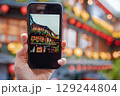Jiufen Old Street is a narrow, winding alleyway with shops, teahouses, and restaurants that offers tourists a view of traditional Taiwanese life. 129244804